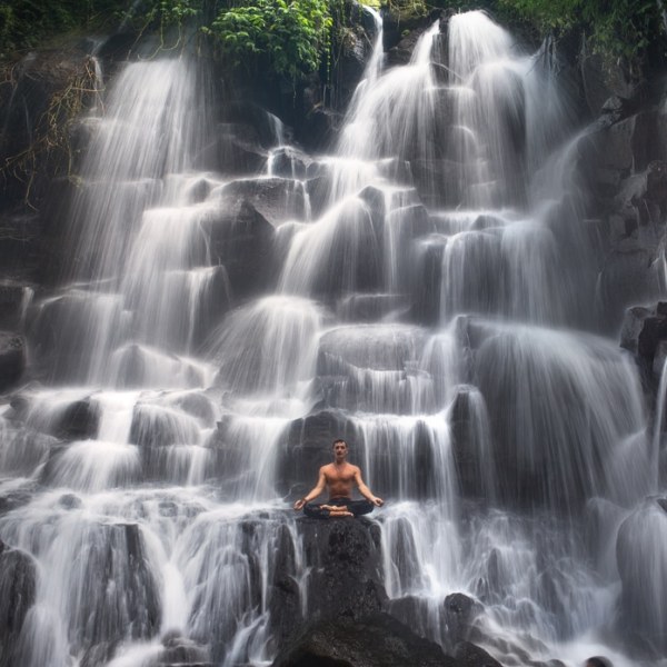 Serenity,And,Yoga,Practicing,At,Waterfall,Kanto,Lampo,,Bali,indonesia